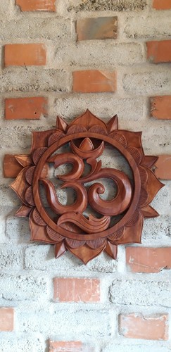 Der anfang relief sonne - om,